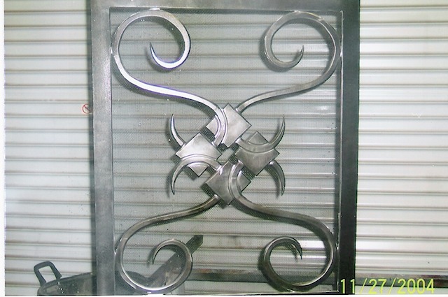 fireplace door before being painted